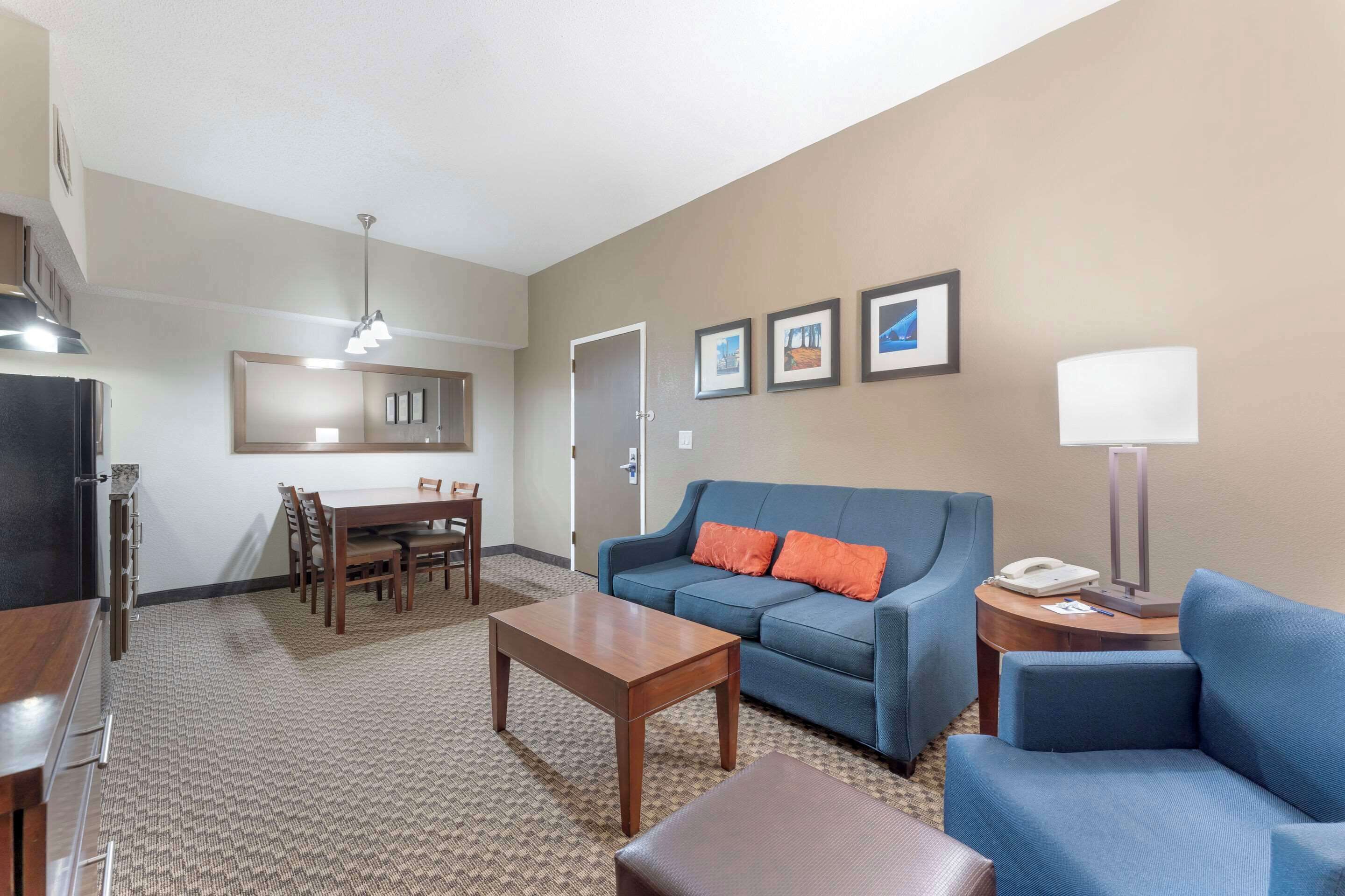 suite, 1 king bed with sofa bed, non smoking (2 rooms) | in-room safe, desk, iron/ironing board, free cots/infant beds