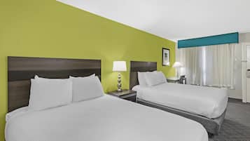 Premium bedding, pillowtop beds, laptop workspace, soundproofing
