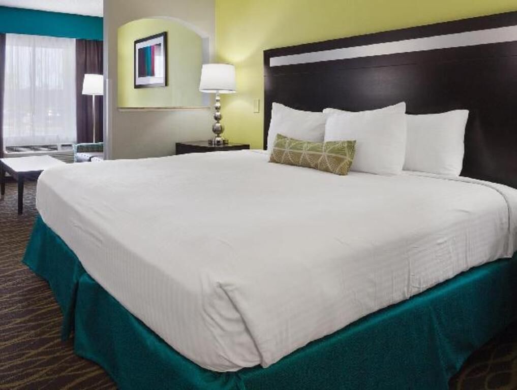 Premium bedding, pillowtop beds, laptop workspace, soundproofing