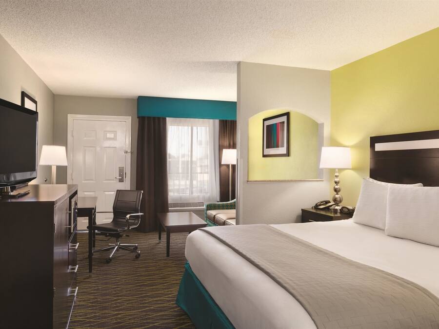 Premium bedding, pillowtop beds, laptop workspace, soundproofing