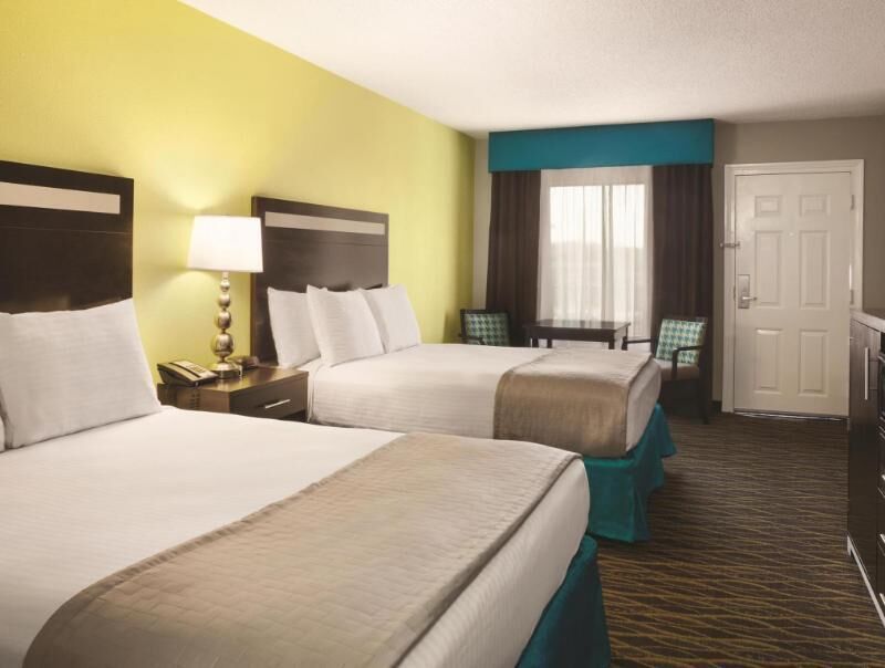 Premium bedding, pillowtop beds, laptop workspace, soundproofing