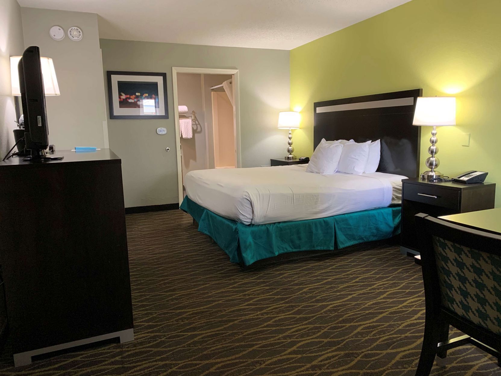 Premium bedding, pillowtop beds, laptop workspace, soundproofing