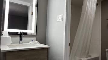 Bañera con ducha, cabezal de ducha con hidromasaje