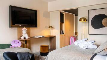 Privilege Room - a double bed and a trundle bed for 2 people