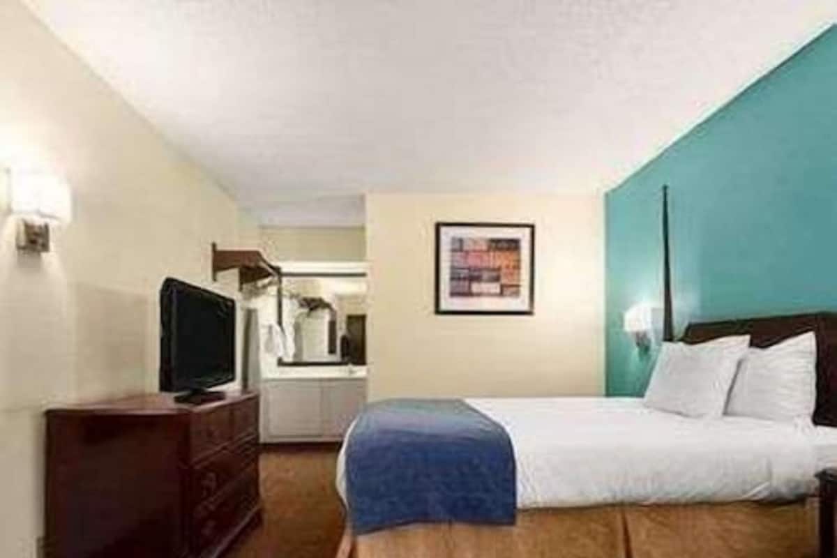 Pillow-top beds, desk, blackout curtains, iron/ironing board