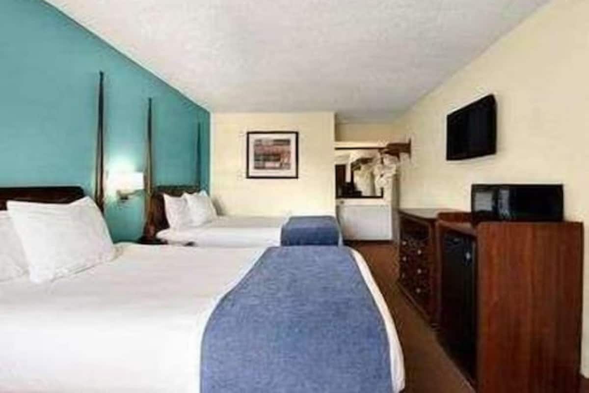 Pillow-top beds, desk, blackout curtains, iron/ironing board