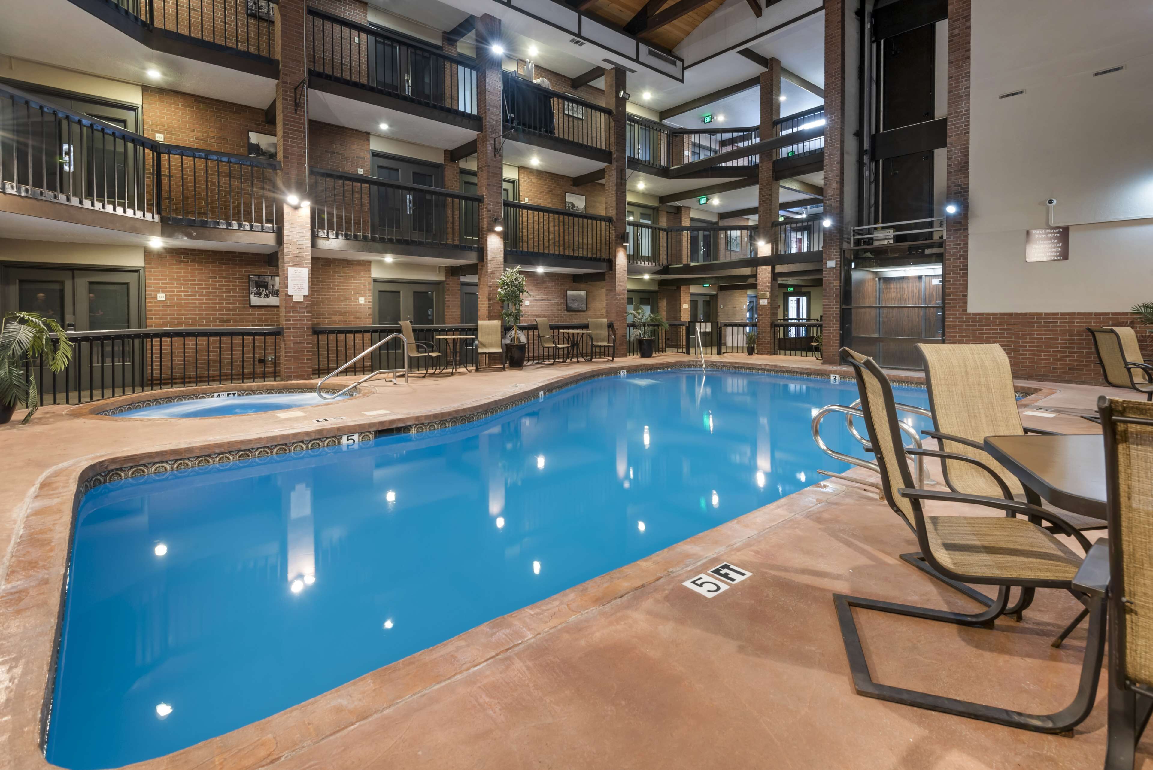 indoor pool, open 9:00 am to 9:00 pm, pool loungers
