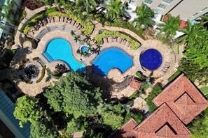 3 outdoor pools, open 6:00 AM to 6:00 PM, pool umbrellas, pool loungers