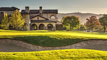 Enjoy a round of golf on our well-maintained fairway with scenic views of the surrounding hills and trees.