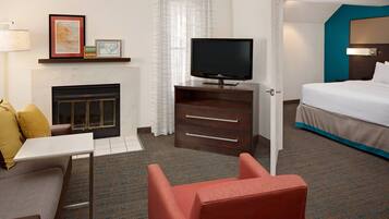 Penthouse Suite with Fireplace | Premium bedding, pillowtop beds, individually decorated