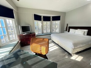 Habitación Deluxe, 1 cama Queen size | Escritorio, wifi gratis y ropa de cama 