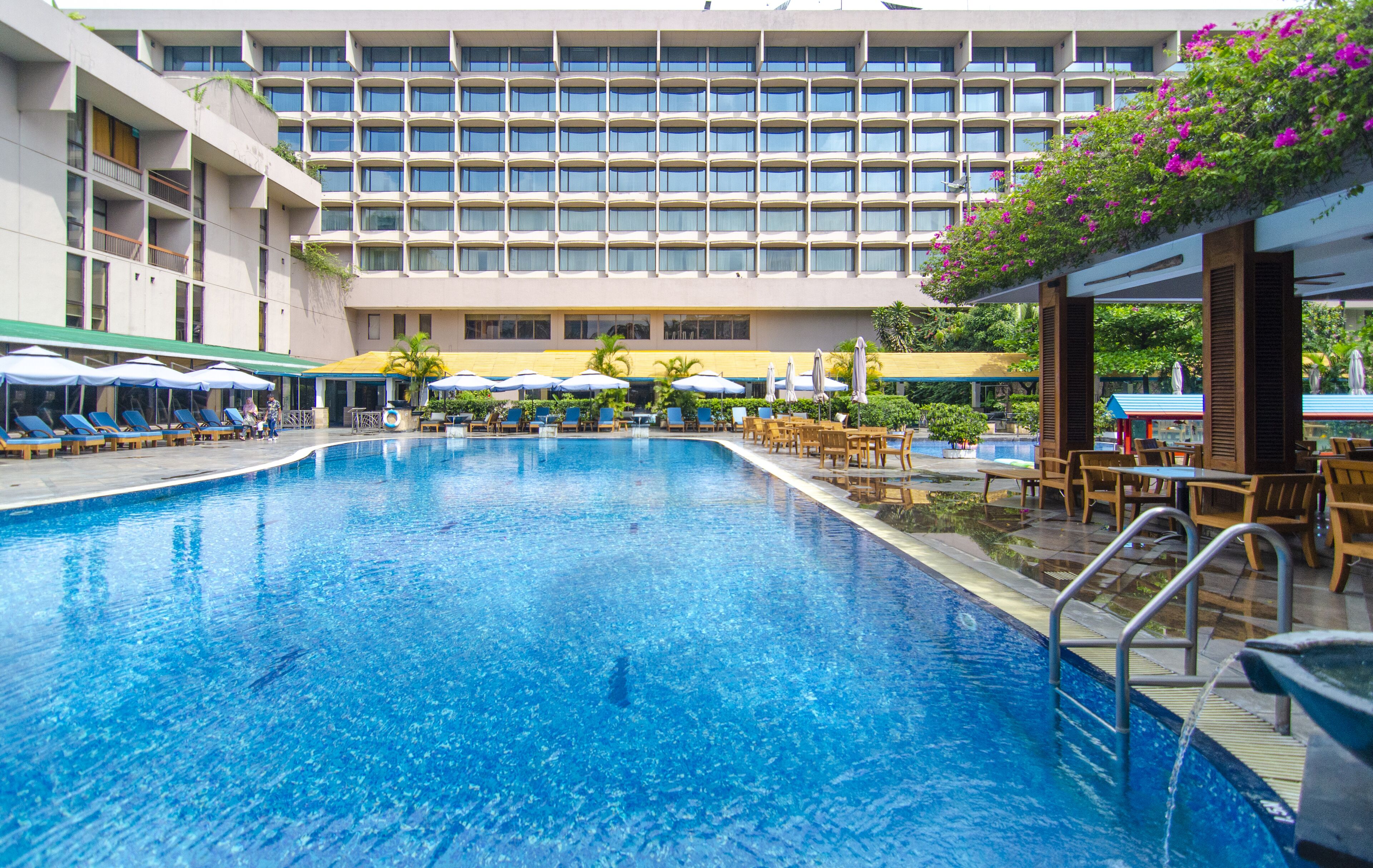 Outdoor pool, pool umbrellas, pool loungers