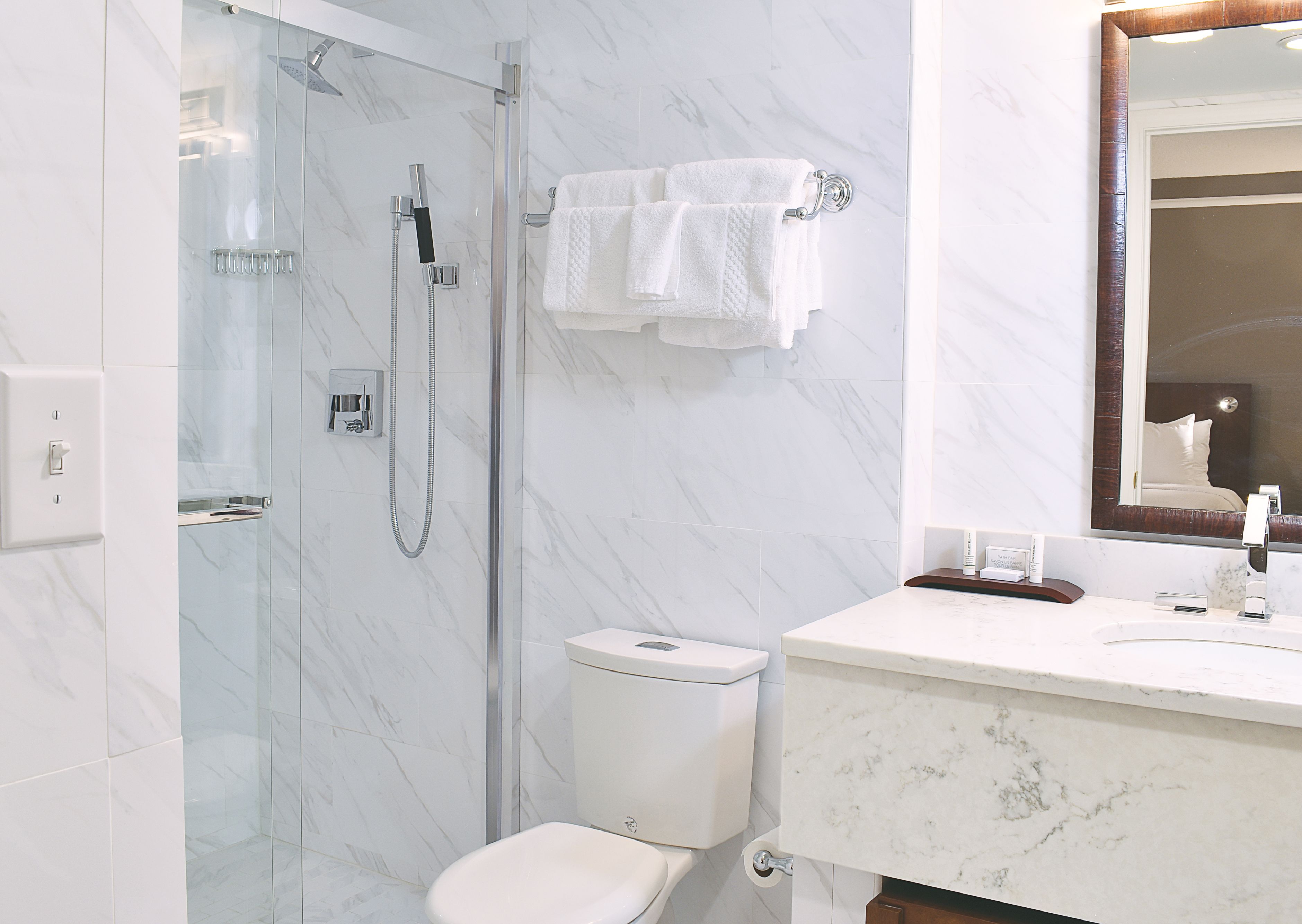 eco-friendly toiletries, hair dryer, towels, soap