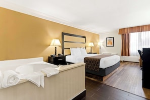 Standard Room, 1 King Bed, Non Smoking, Jetted Tub | Desk, laptop workspace, iron/ironing board, free cots/infant beds