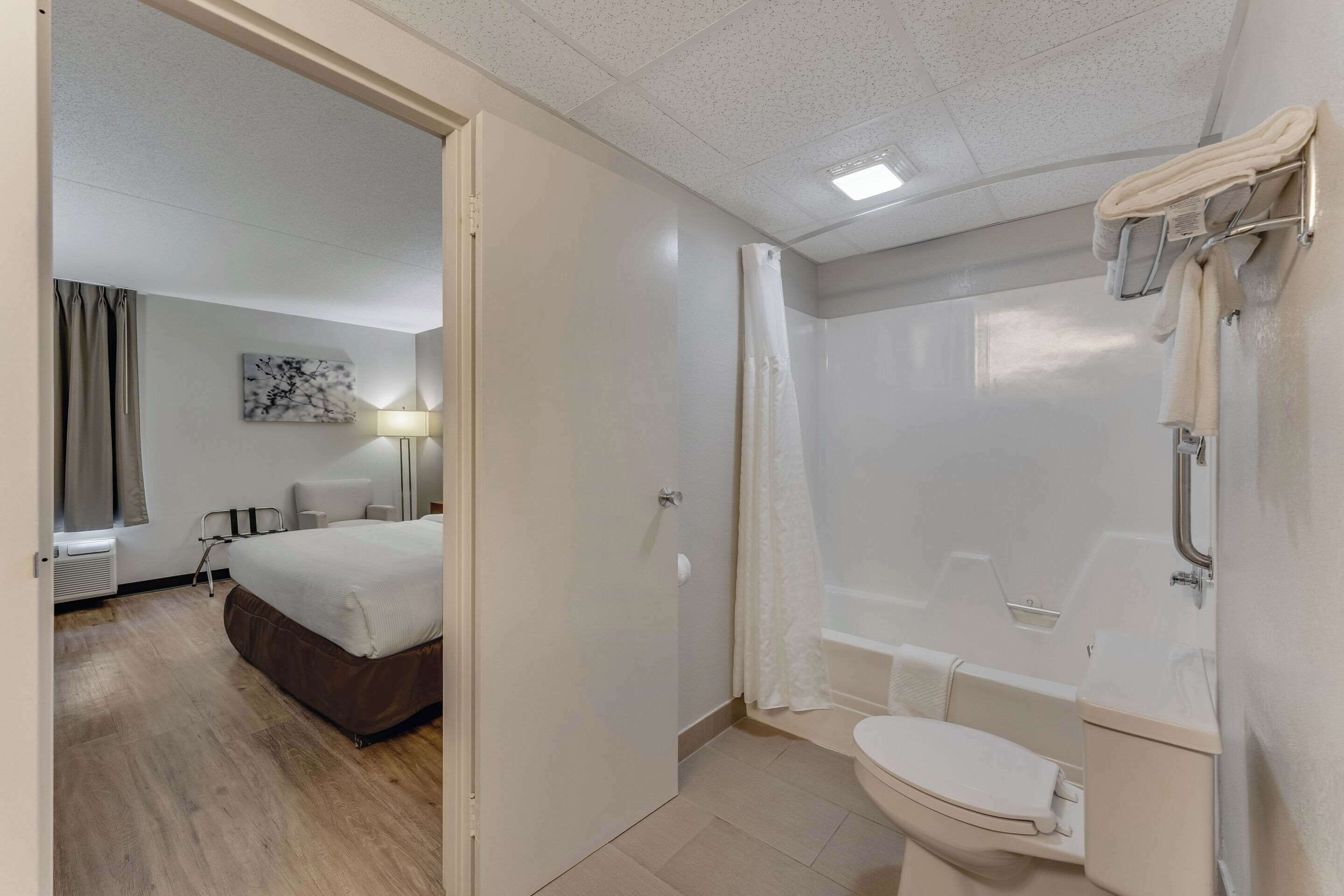 Suite, 1 King Bed, Non Smoking | Desk, blackout drapes, iron/ironing board, free cribs/infant beds