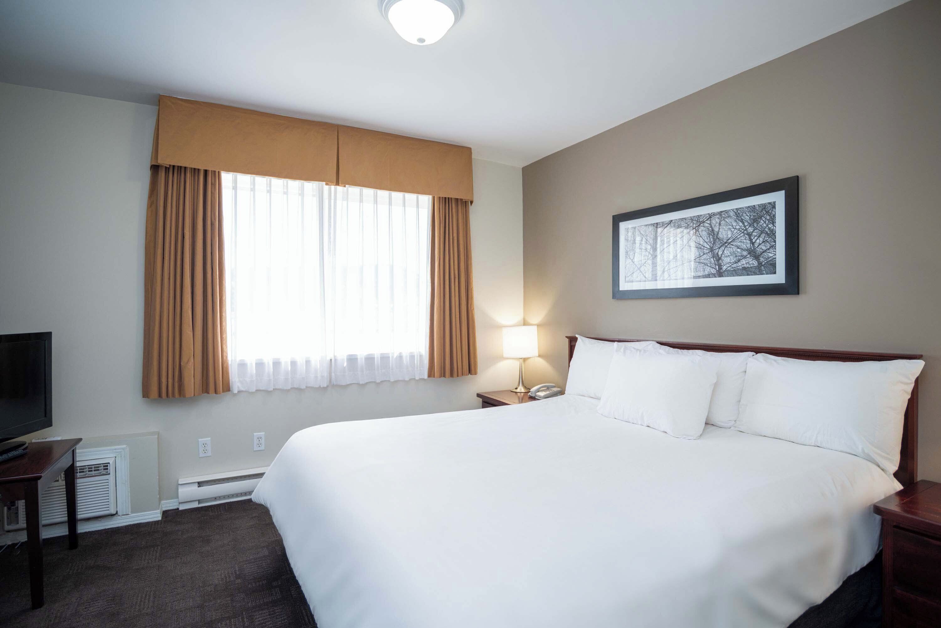 In-room safe, desk, laptop workspace, blackout drapes