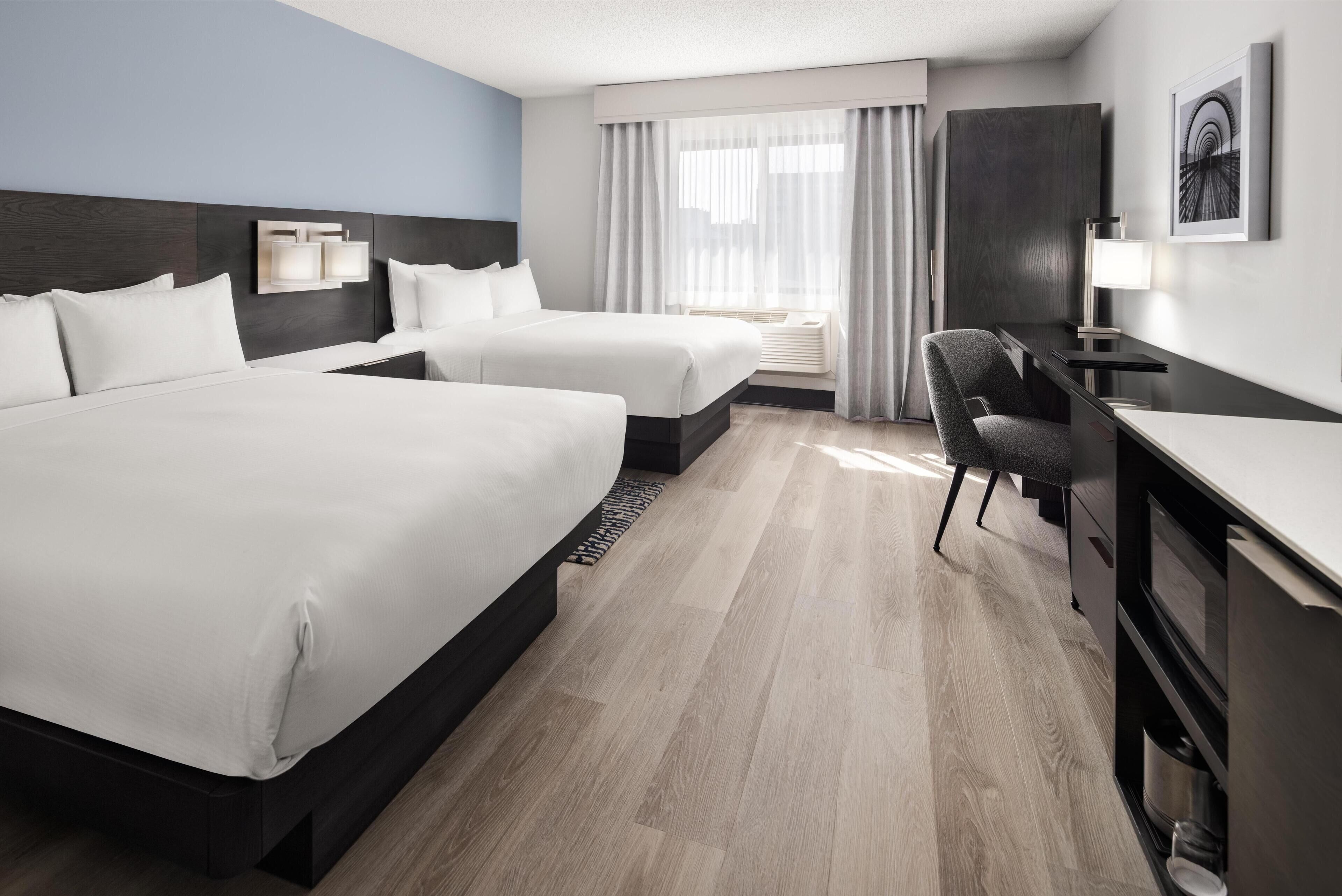 Room, 2 Double Beds, Accessible, Non Smoking (w/ roll-in shower) | In-room safe, desk, iron/ironing board, free cribs/infant beds