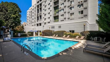 Seasonal outdoor pool, open 8:00 AM to 8:00 PM, pool loungers