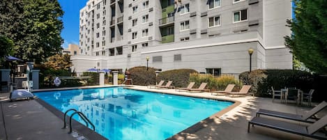 Seasonal outdoor pool, open 8:00 AM to 8:00 PM, pool loungers