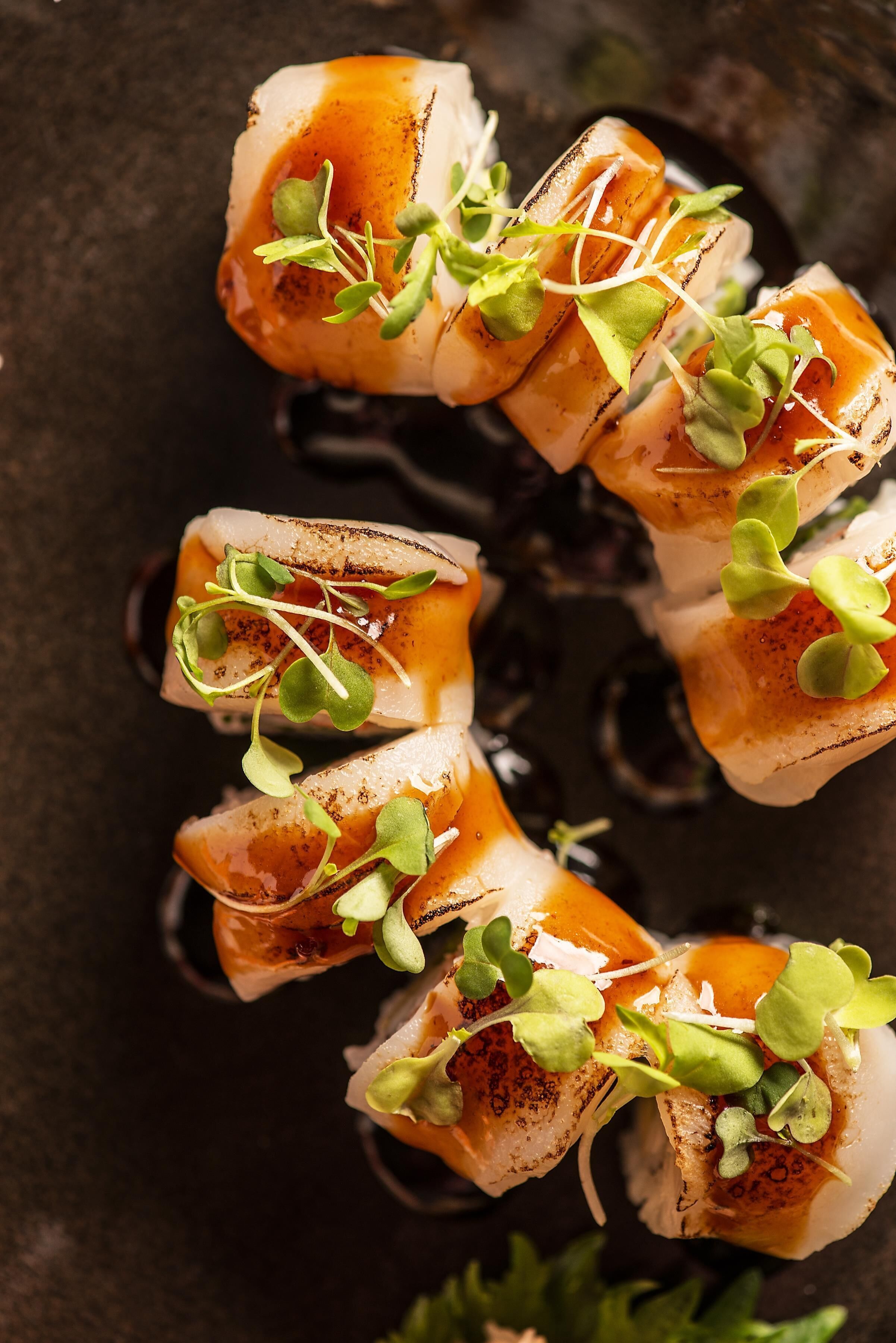 A close-up of food items with a dark background.