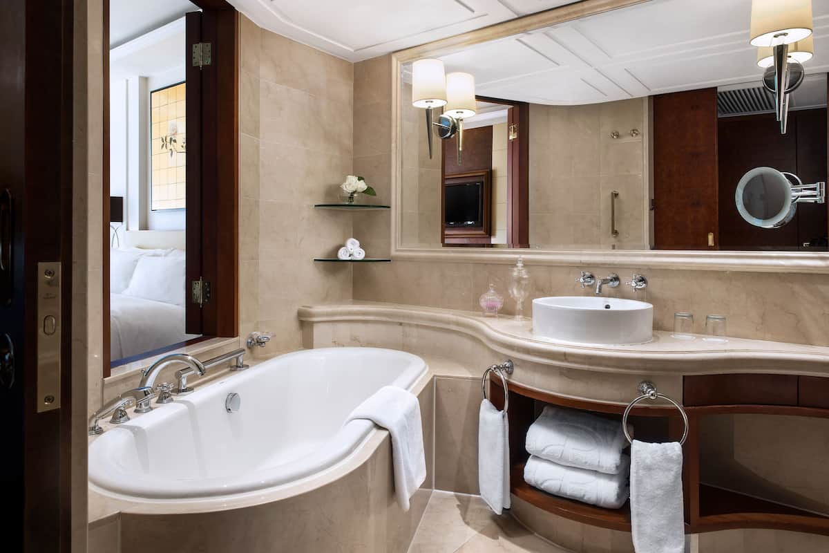 separate bathtub and shower, free toiletries, hair dryer, bathrobes