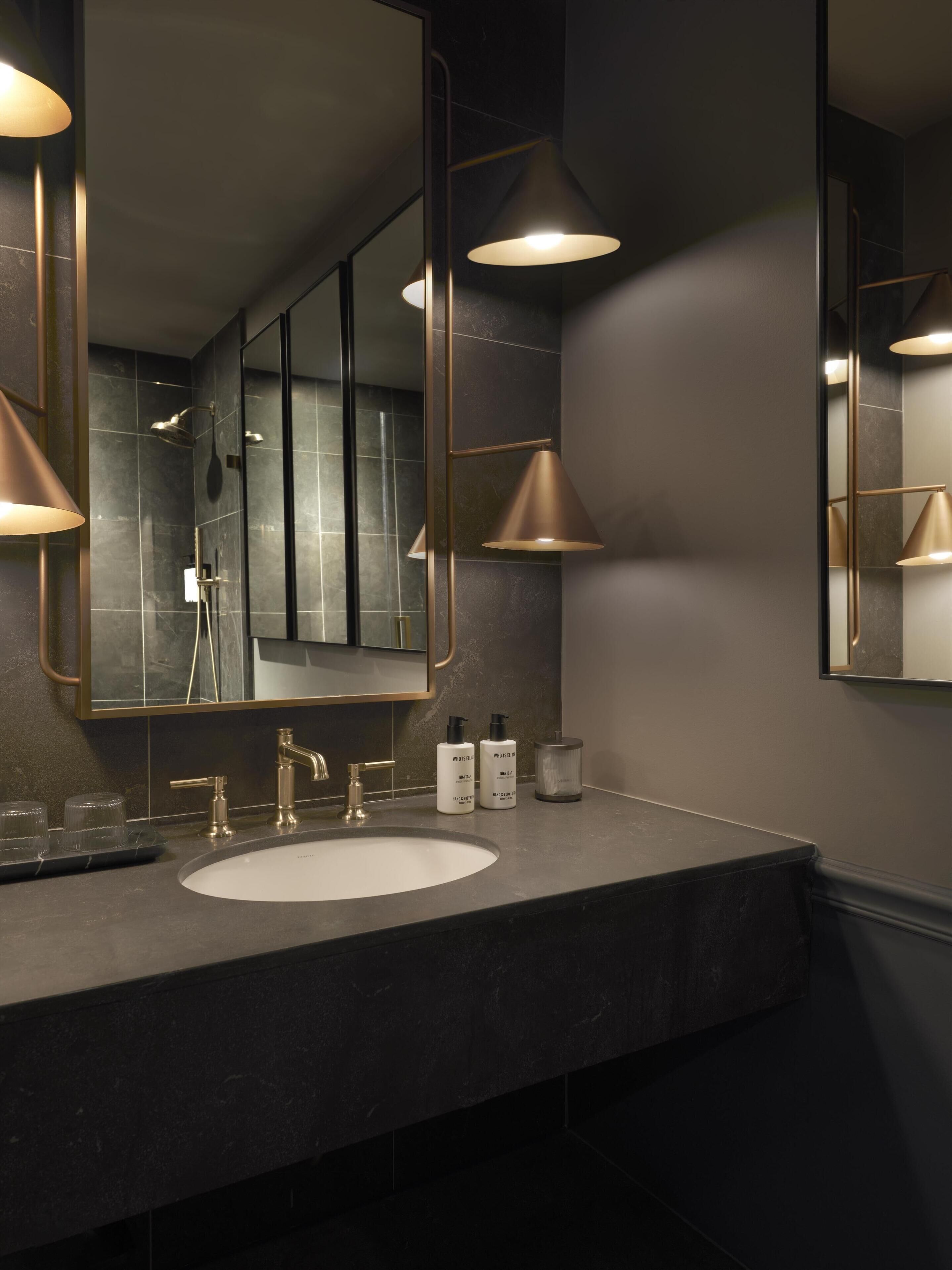 designer toiletries, hair dryer, bathrobes, slippers