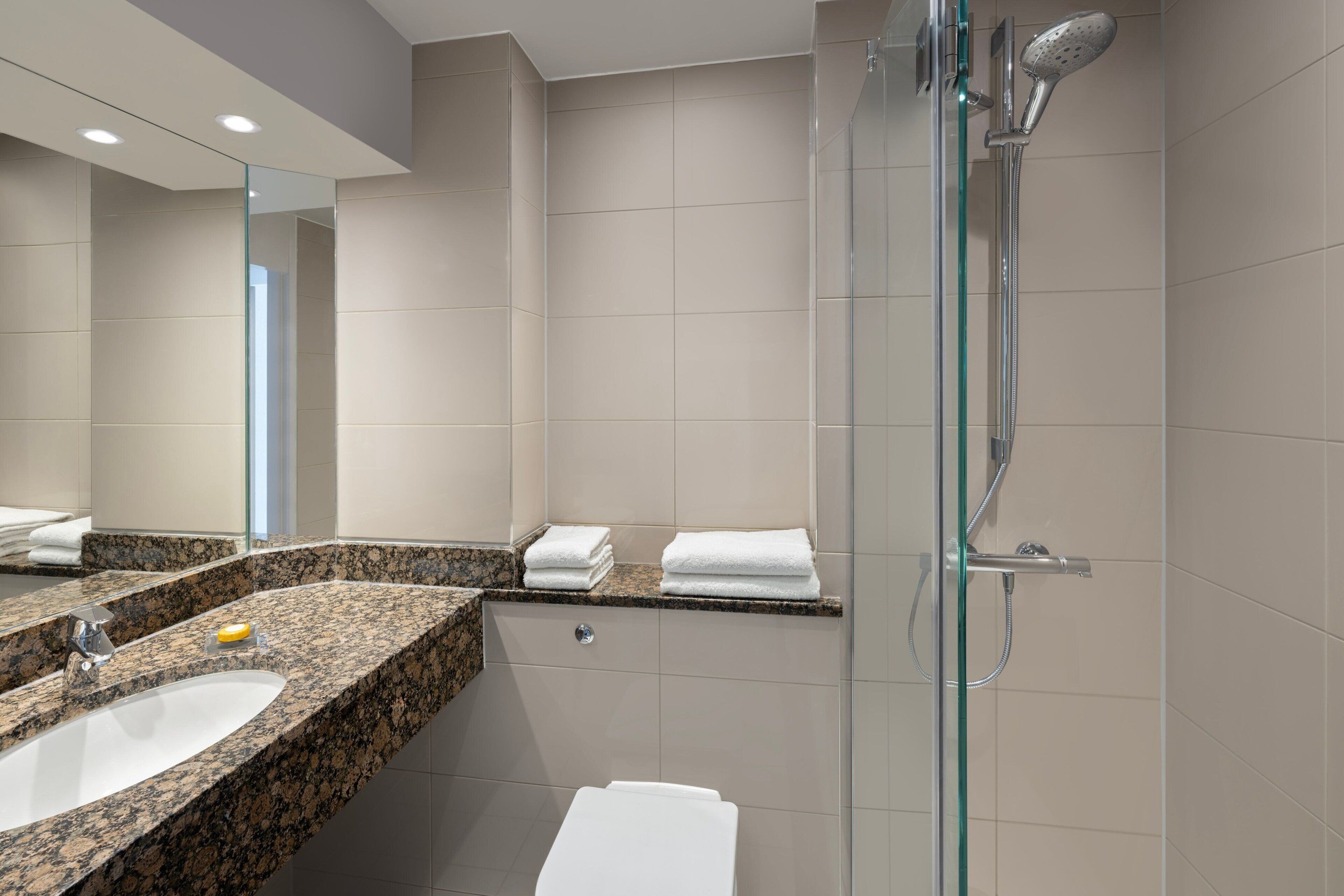 deep-soaking bathtub, free toiletries, hair dryer, towels