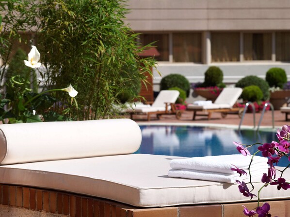 Outdoor pool, pool umbrellas, pool loungers