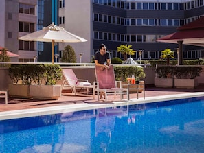 Outdoor pool, pool umbrellas, sun loungers