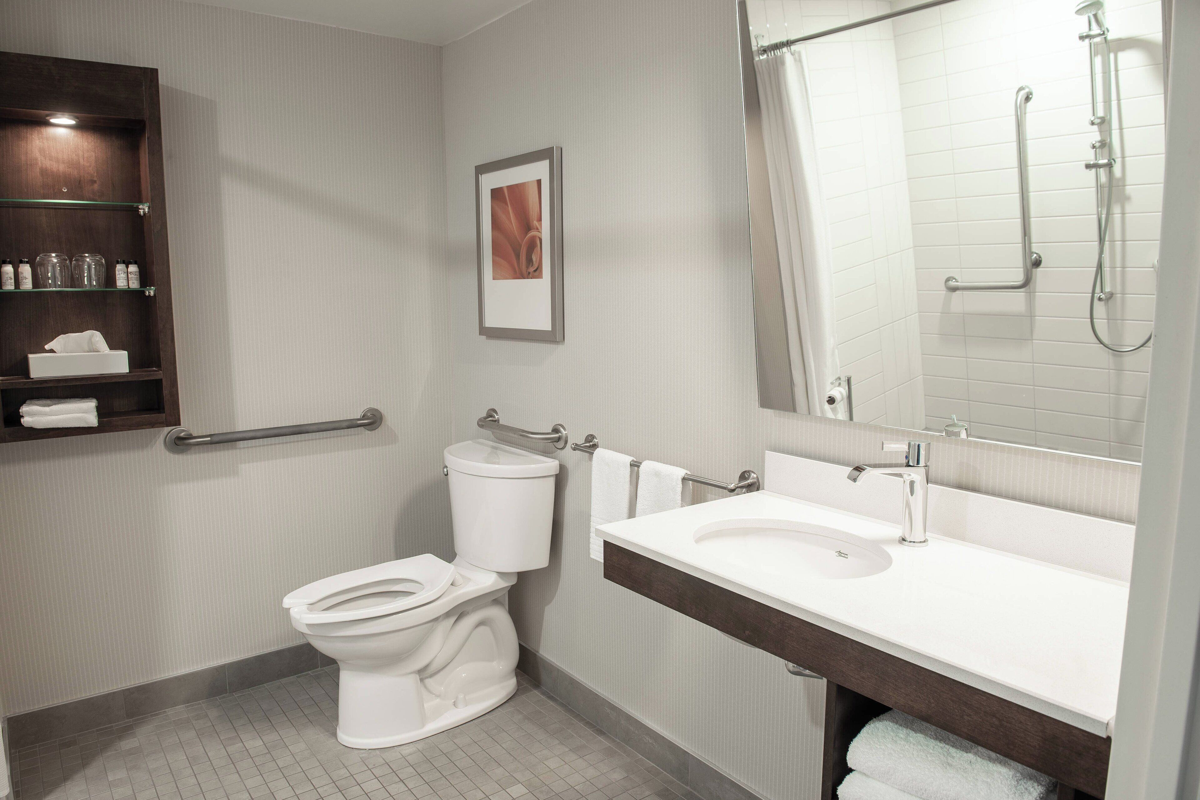 eco-friendly toiletries, hair dryer, towels, soap