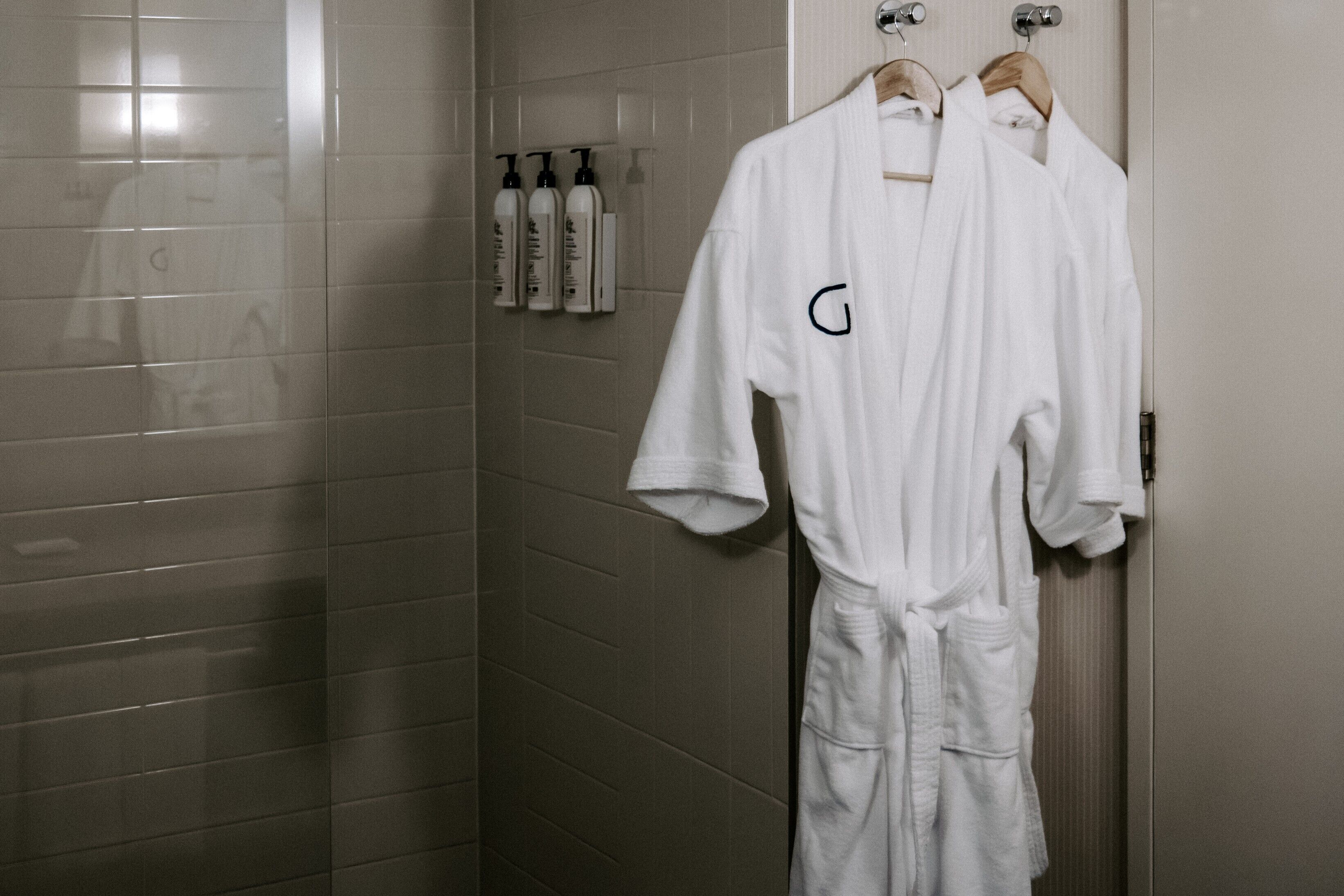 eco-friendly toiletries, hair dryer, towels, soap