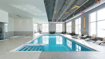 Indoor pool, open 8:00 AM to 10:00 PM, pool umbrellas, sun loungers