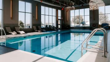 Indoor pool, open 8:00 AM to 10:00 PM, pool umbrellas, pool loungers