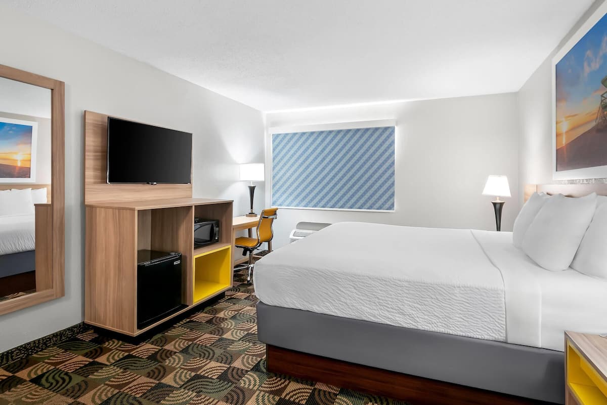 Standard Room, 1 King Bed | Desk, iron/ironing board, free cots/infant beds, rollaway beds