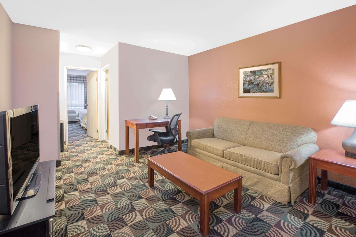 Suite, 1 Bedroom | Desk, iron/ironing board, free cribs/infant beds, rollaway beds