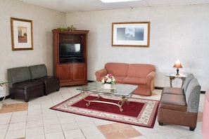 27-inch flat-screen TV with cable channels, TV