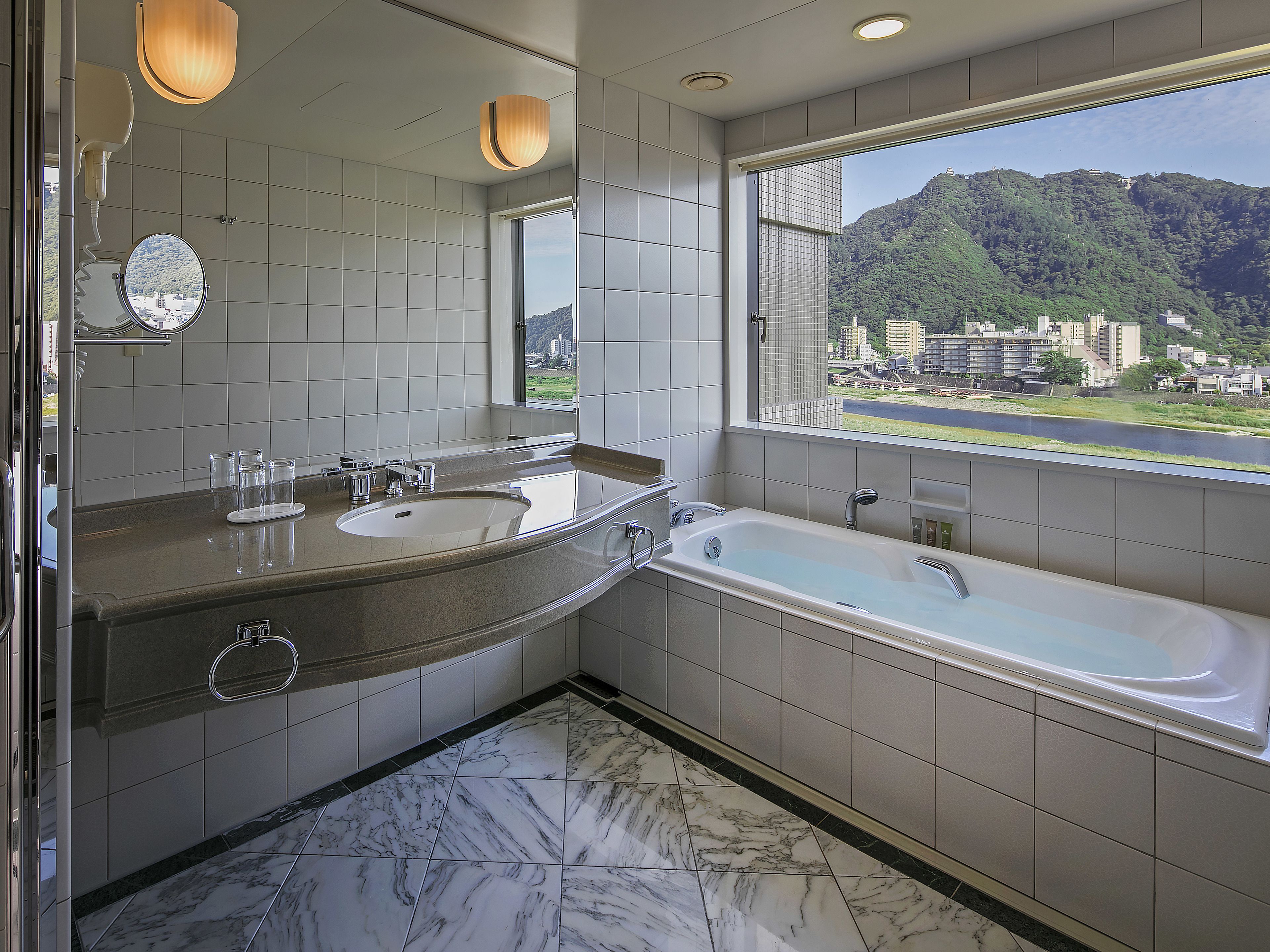 free toiletries, hair dryer, slippers, bidet