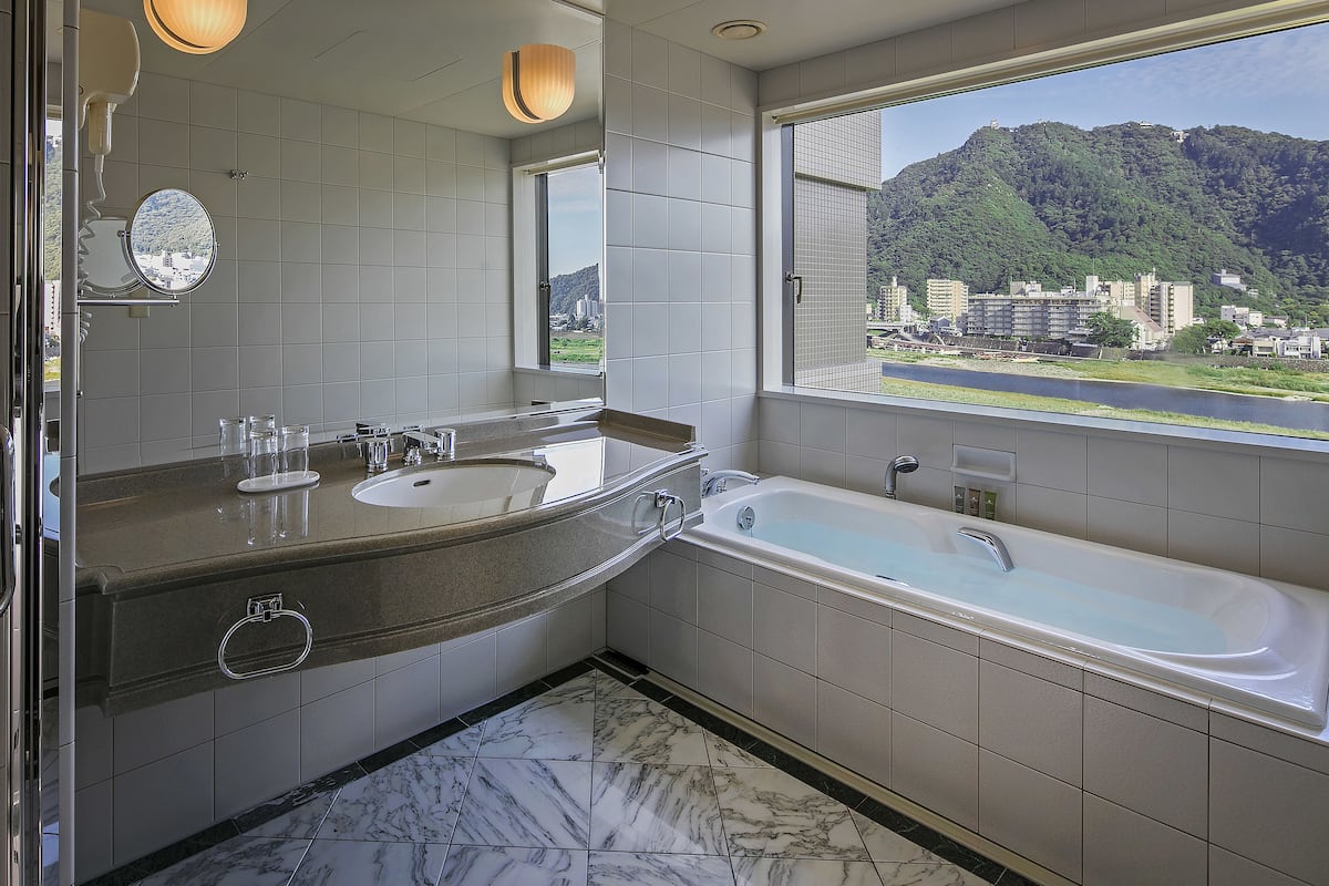 free toiletries, hair dryer, slippers, bidet