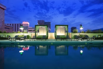 Outdoor pool, open 9:00 AM to 8:00 PM, cabanas (surcharge), sun loungers at Silver Legacy Resort  Casino at THE ROW