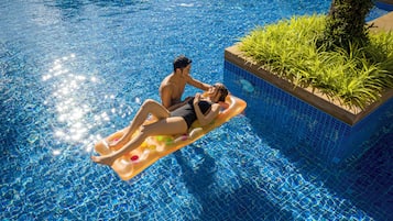 6 outdoor pools, open 8:00 AM to 7:00 PM, pool umbrellas, pool loungers