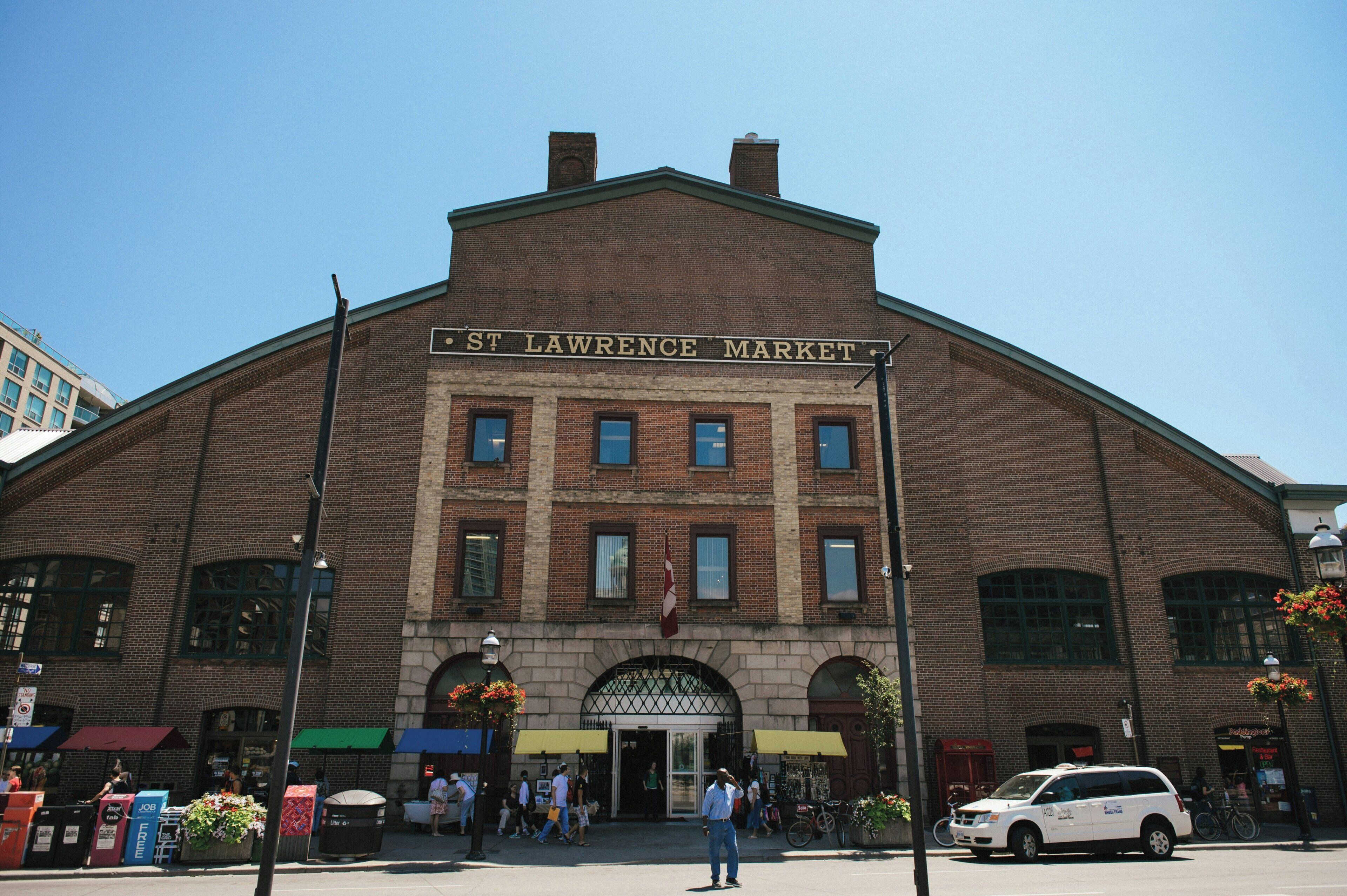 A historic building with a sign reading 'St. Lawrence Market.'