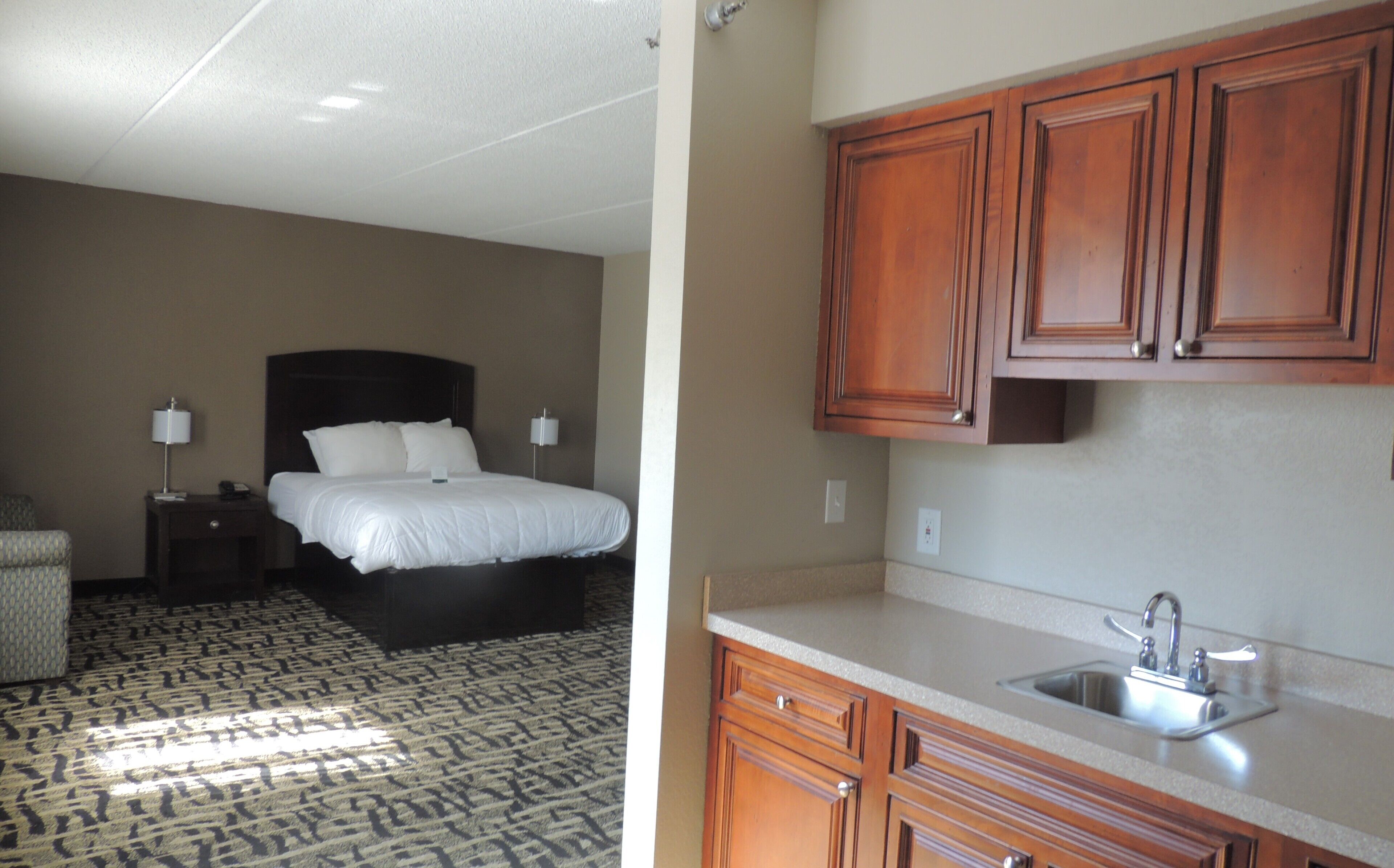 suite, 1 king bed, non smoking | premium bedding, desk, laptop workspace, iron/ironing board