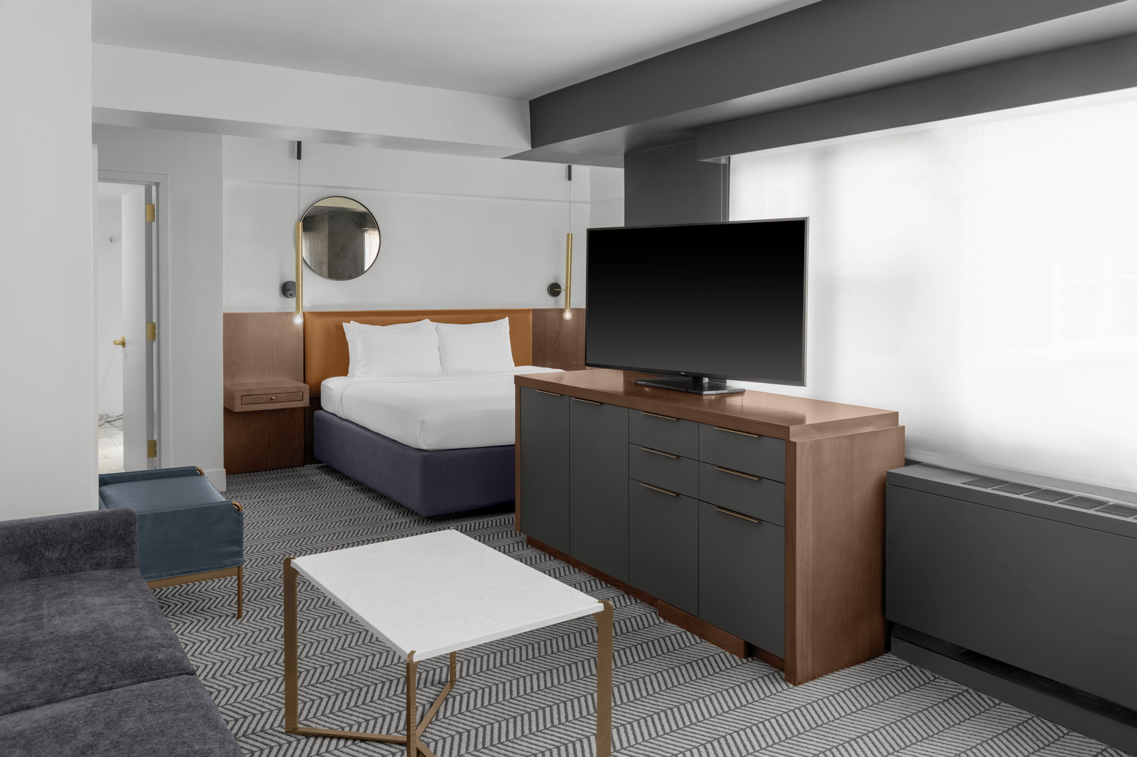 Junior Suite, 1 King Bed with Sofa bed | Living area | 55-inch Smart TV with digital channels, pay movies