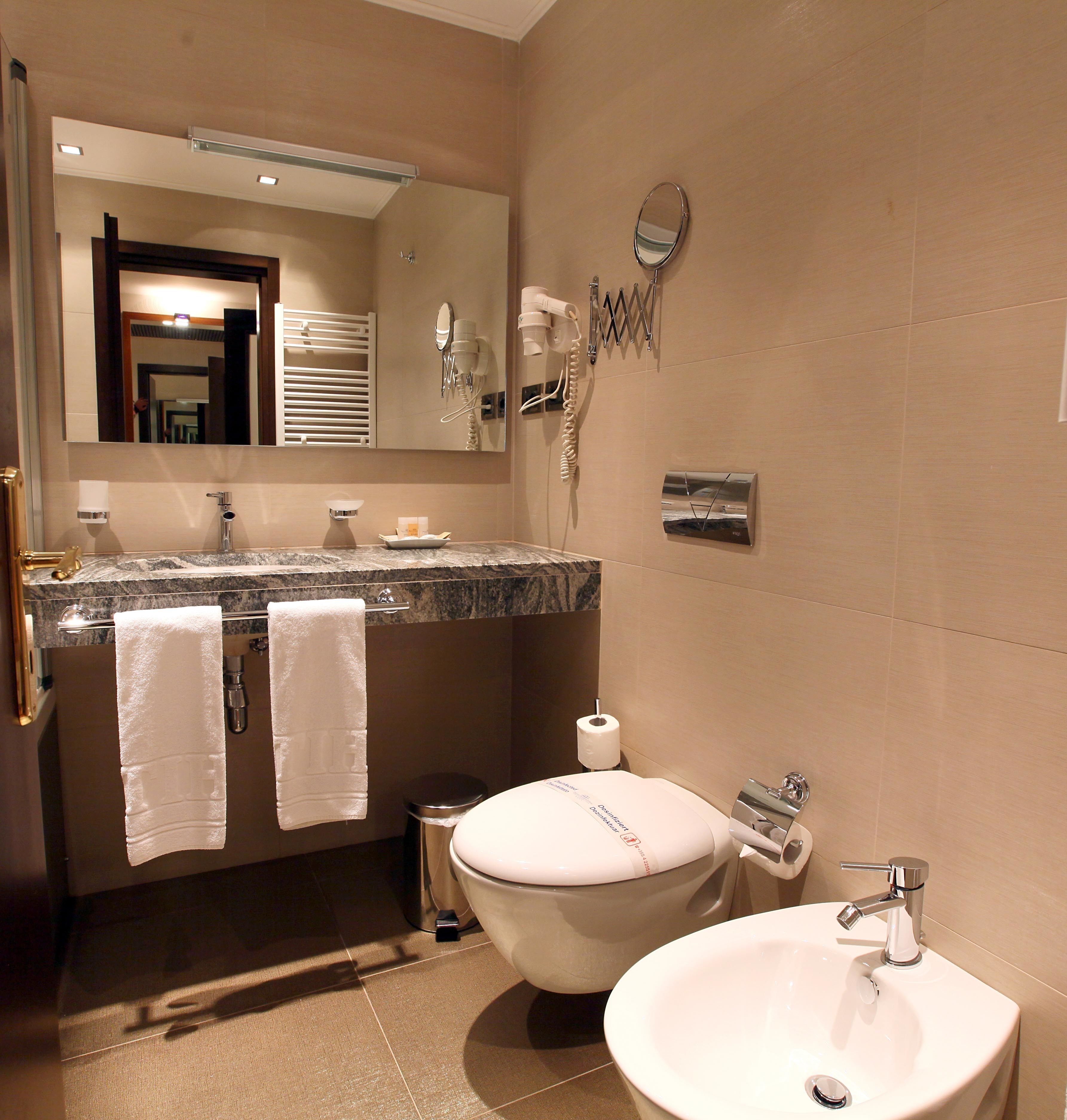 rainfall showerhead, free toiletries, hair dryer, bathrobes