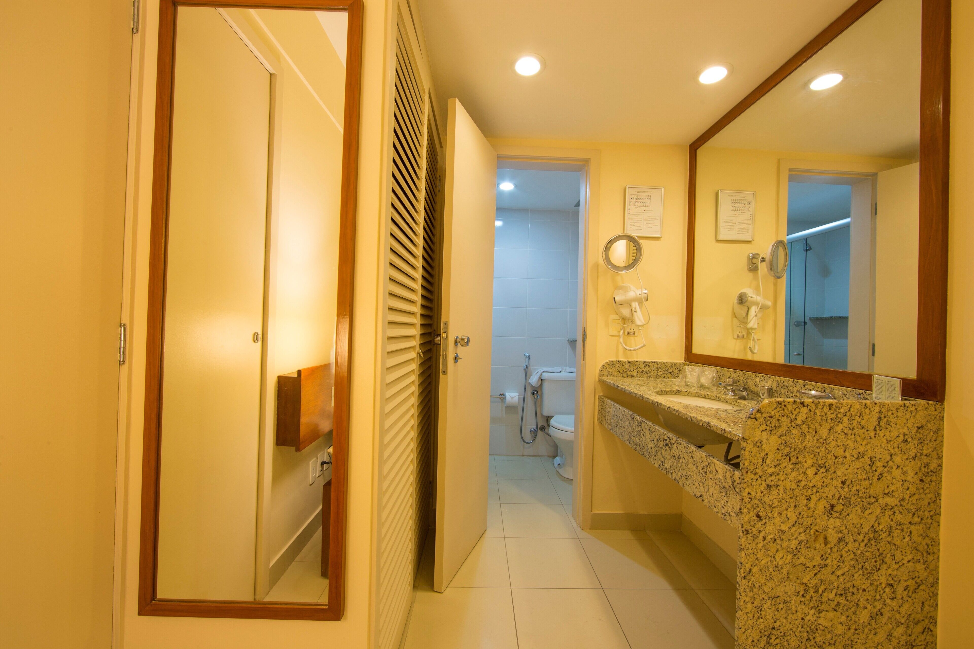 economy room | minibar, in-room safe, desk, blackout curtains