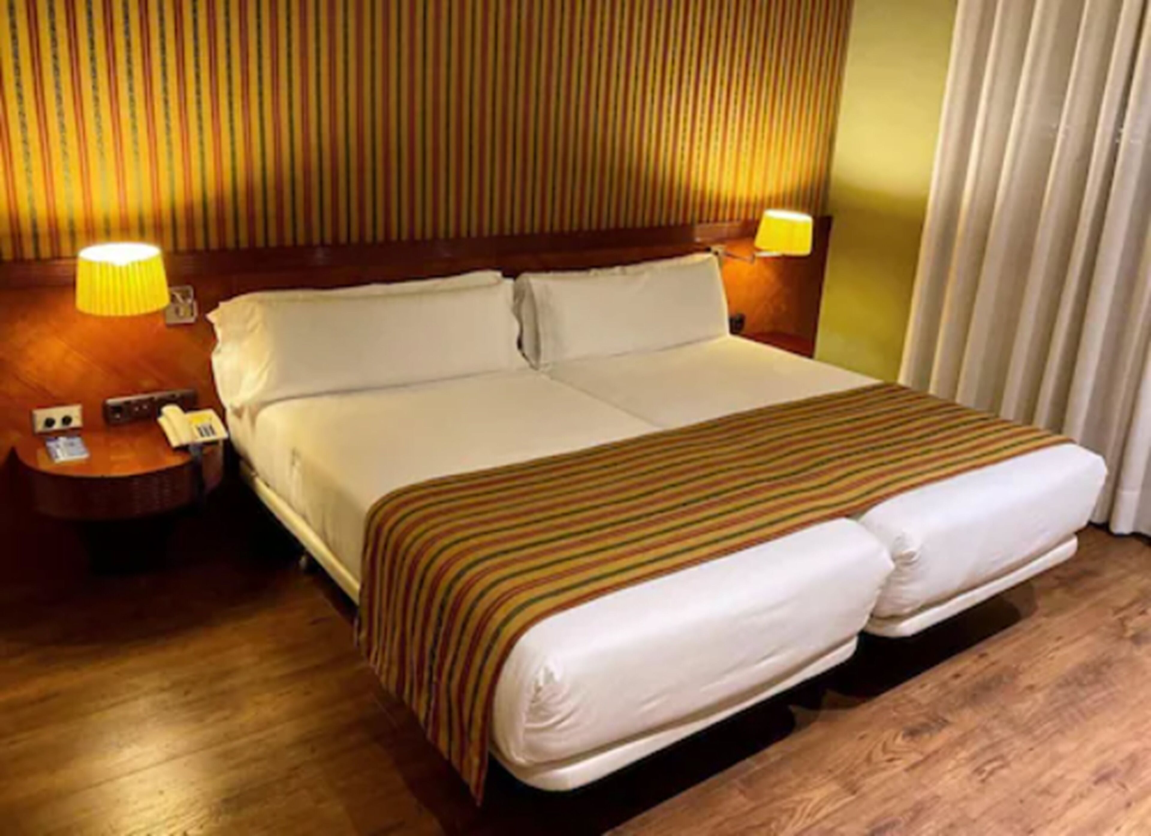 twin room single occupancy | 1 bedroom, minibar, in-room safe, desk