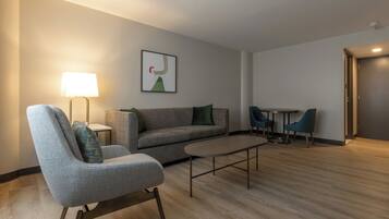 Desk, laptop workspace, blackout curtains, iron/ironing board