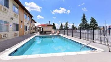 Outdoor pool, open 8:00 AM to 11:00 PM, sun loungers