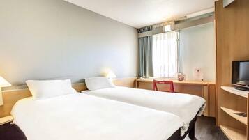 Premium bedding, in-room safe, individually decorated