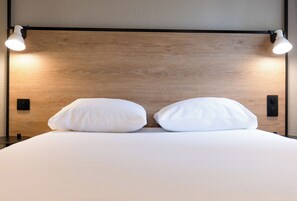 Premium bedding, in-room safe, individually decorated